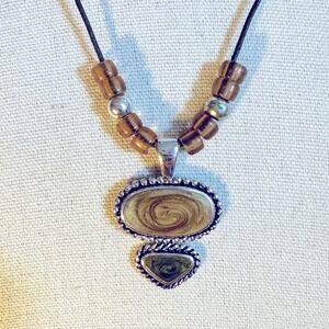 Kenneth Cole Pendant Necklace Black Cord Silver tone Green tan KC Mark Western